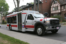 The Friendly Bus parked curb-side.